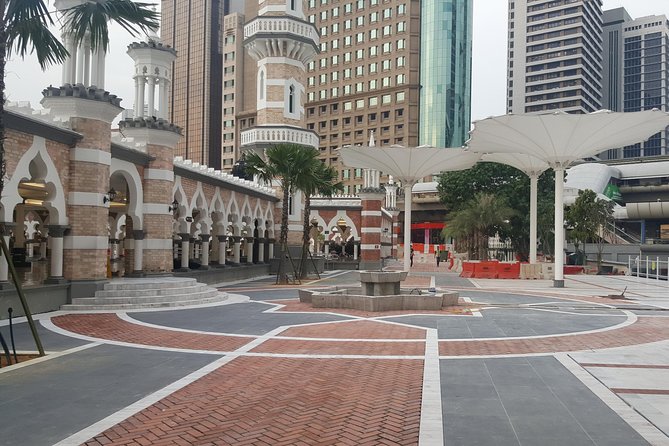 Aquaria KLCC Admission with Kuala Lumpur City Famous Landmarks - National Monument (Tugu Negara) to Merdeka Square: a fast history sampler