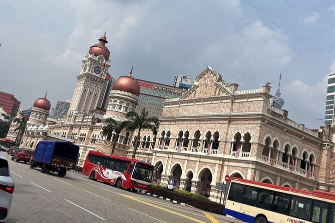 Exclusive Half Day Batu Caves and Private City Tour Kuala Lumpur - Petronas Twin Towers: the iconic photo stop before you head back