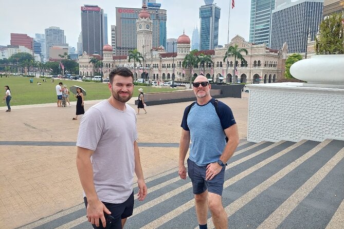 Full-Day Kuala Lumpur Sightseeing Tour - Central KL heritage: mosques, monuments, flags, and Moorish buildings