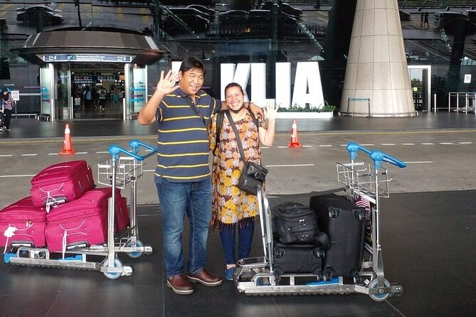 Kuala Lumpur City to Kuala Lumpur International Airport Transfer - Booking essentials: flight name/number, pickup details, and contact info