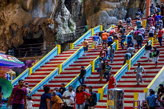 Kuala Lumpur Half Day Batu Caves And Cultural Group Tour - Batu Caves: 272 steps, Hindu shrines, and a limestone spectacle