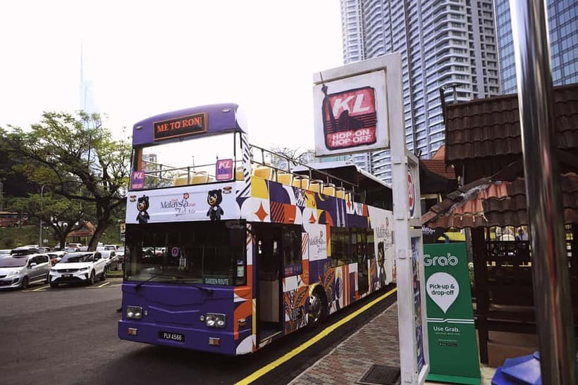 Kuala Lumpur: Ronda Hop-On Hop-Off City Sightseeing Bus Pass - Onboard comfort: open-top views, Wi-Fi, and the audio reality