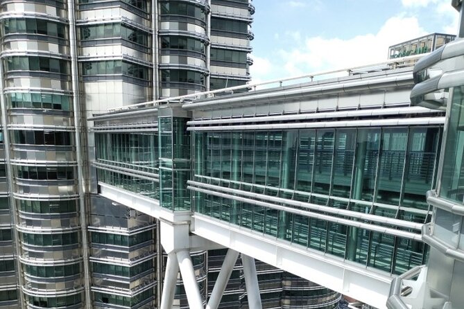 Petronas Twin Tower Skybridge View & Dining Experience Tour with Local Host - Booking the Skybridge and Petrosains slot: what the time stamp really buys you