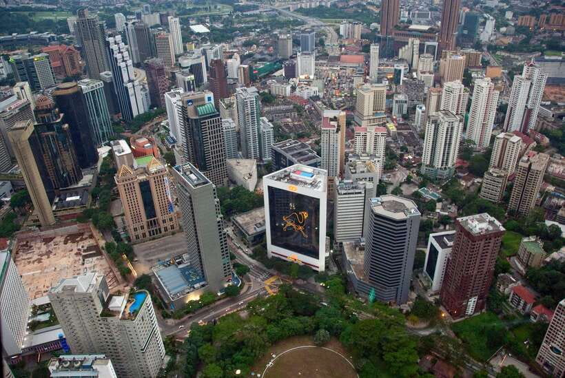 Private Kuala Lumpur and Putrajaya Highlights in One Day - Batu Caves: Hindu shrines, limestone steps, and big cave energy